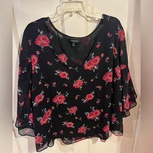 Black sheer blouse with red roses.  Has built in cami.